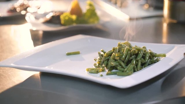 Master chief making meat's dish presentation in 4K
