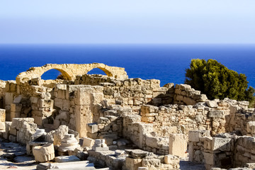 Beautiful scenery of the ruins of arches on a rock by the sea. / Ruins by the sea / Curion, Cyprus