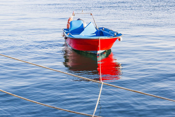 Red and blue fishing boat