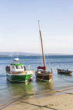 Boats moored on the beach