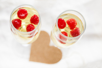 Valentine's day, celebration with glasses of champagne and heart
