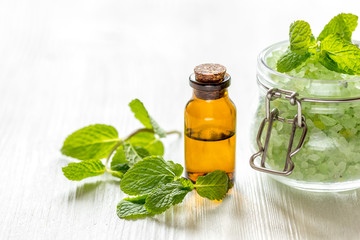 organic cosmetics with herbal extracts of mint on wooden background - obrazy, fototapety, plakaty