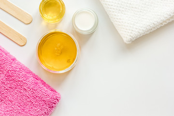 concept depilation with wax on white background top view