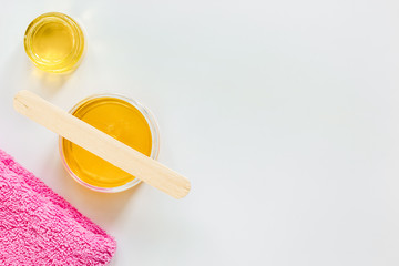 concept depilation with wax on white background top view