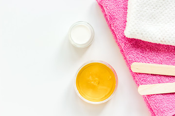 concept depilation with wax on white background top view