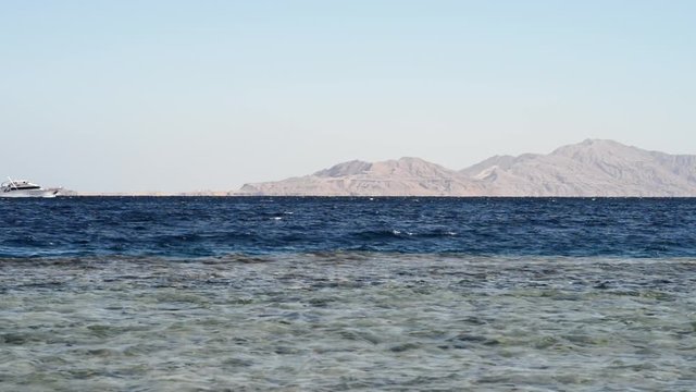 boat in the sea. ship in the sea. beautiful evening landscape of sea and mountains. Evening view of the red sea