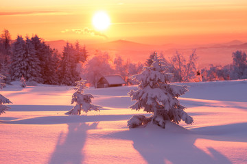 Sunrise over a cold winter landscape