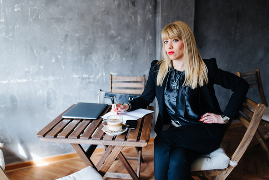 Woman Showcasing A Proper Business Attire.