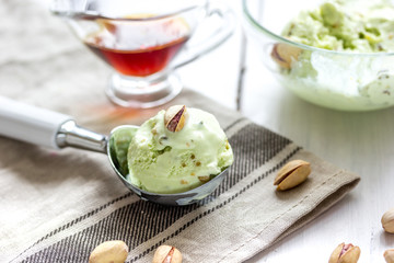 organic homemade ice cream in glass bowl on wooden background