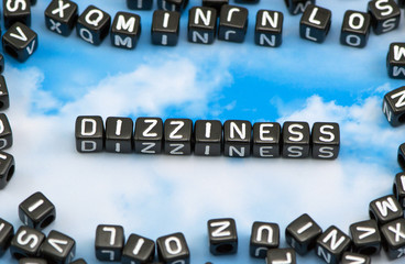 The word Dizziness on the sky background