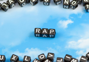 The word rap on the sky background