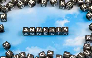 The word amnesia on the sky background