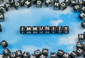The word Immunity on the sky background