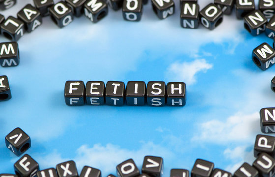 The word Fetish on the sky background