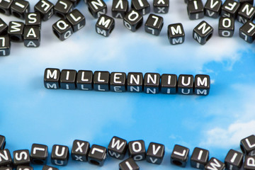 The word millennium on the sky background