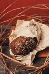 rye bread In a paper box, the branches of a tree