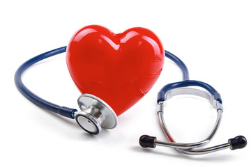 Red heart and a stethoscope on desk