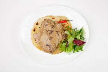 Beautiful meat dish on a white background