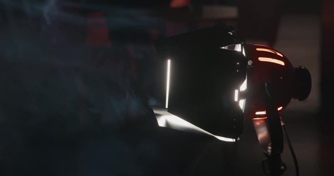 Redhead Film Production Light Turning on with Smoke on Set