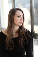 Woman with Brown Hair and Beautiful Blue Eyes