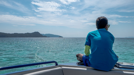 A man sitting lonely on boat