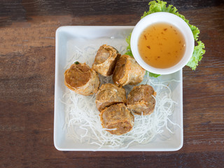 Deep Fried Crab Meat Rolls or Hoi Jo. Traditional local Chinese food for appetizer. (selective focus)
