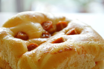 bread topping slice pork sausage on dish