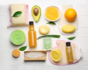 Body care set for peeling on wooden background