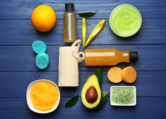 Body care set for peeling on wooden background