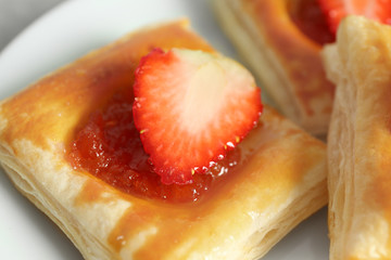 Sweet tasty pastries with strawberries, closeup