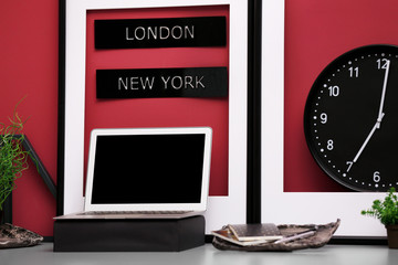 Workplace with laptop on table in modern room