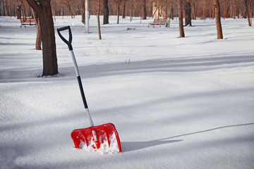 Red shovel for snow removal