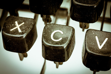 C letter on a vintage typewriter keyboard