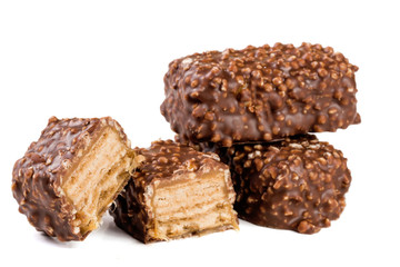 chocolate candy with nuts isolated on white background