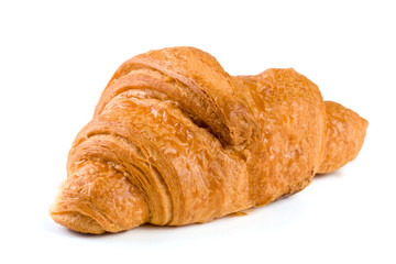 one croissant isolated over a white background closeup
