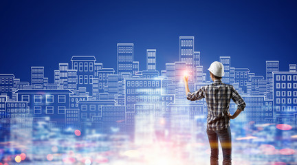 Builder woman sketching project . Mixed media