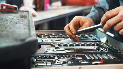 Set of tools for repair in car service, close up