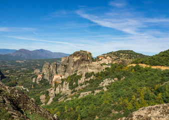 Fototapeta na wymiar The Meteora is one of the largest and most precipitously built complexes of Eastern Orthodox monasteries. The six monasteries are built on natural conglomerate pillars. Greece, October, 2016.