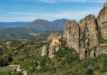 Fototapeta na wymiar The Meteora is one of the largest and most precipitously built complexes of Eastern Orthodox monasteries. The six monasteries are built on natural conglomerate pillars. Greece, October, 2016.