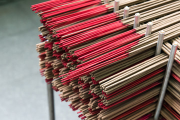Red incense sticks. Materials used in asia religion culture