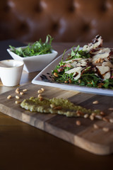 Arugula salad with parmezana cheese and raw meat
