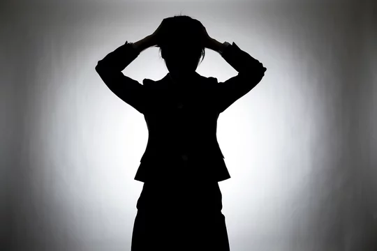 シルエットの女性 頭を抱える Stock 写真 Adobe Stock
