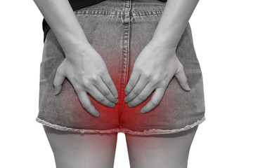 woman touch her bottom with hemorrhoids and constipation