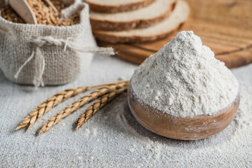 wheat and flour on the table