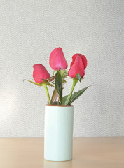 Rose flower in vase  on table