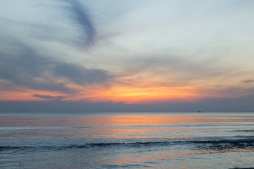 Fototapeta na wymiar The sky at sunset on the beach