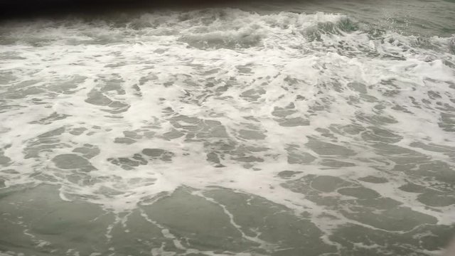 Waves from big ship in the sea