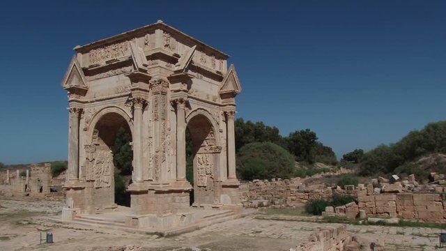 Wide shot of the Arch of Septimius Severus in Leptis Magna the extensive Roman ruins near Al Homs, Libya