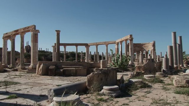 Low wide shot of the market of Leptis Magna the extensive Roman ruins near Al Homs, Libya