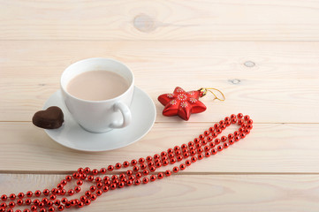 cocoa in a mug with chocolate chip cookies